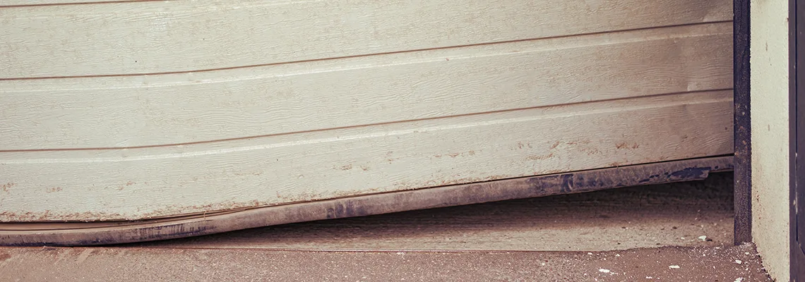 Repair Tilted Overhead Garage Door in Moline, IL