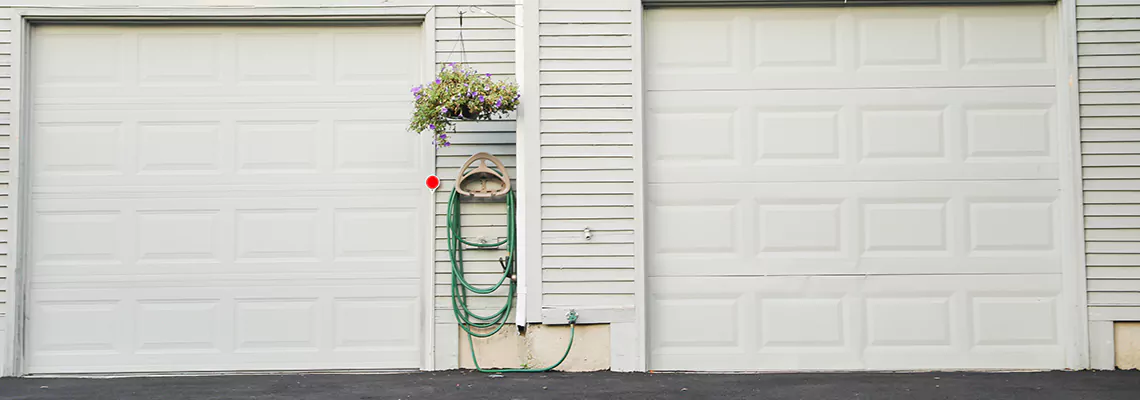 Sectional Garage Door Dropped Down Repair in Moline, Illinois